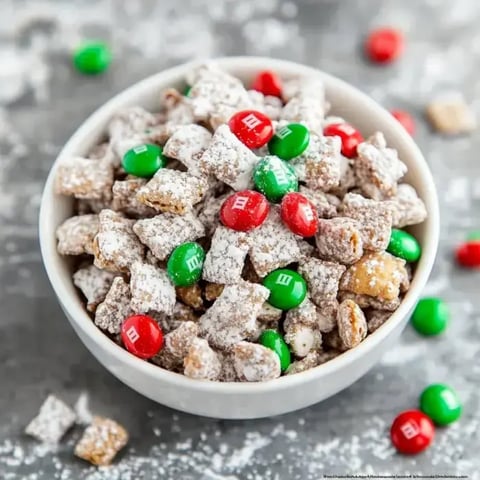 A festive bowl packed with cereal bits coated in sugar and dotted with red and green candies.