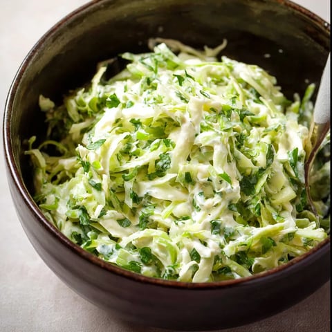A bowl of coleslaw.